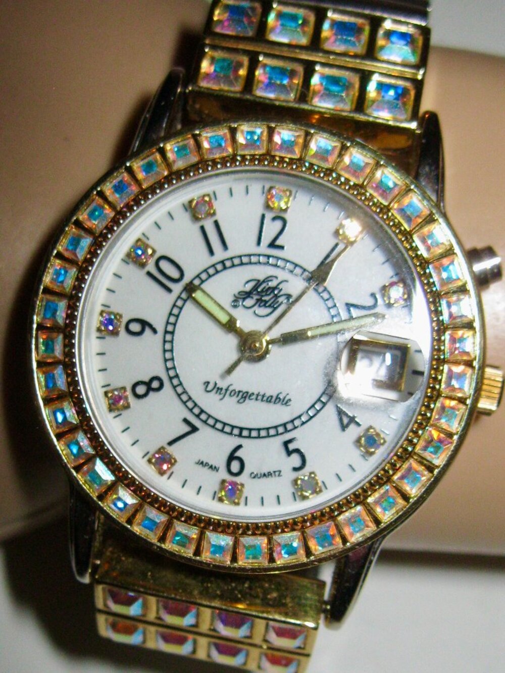 KIRKS FOLLY BEAUTIFUL AURORA BOREALIS WATCH W/STRETCHING BAND HAS MANY OPTIONS